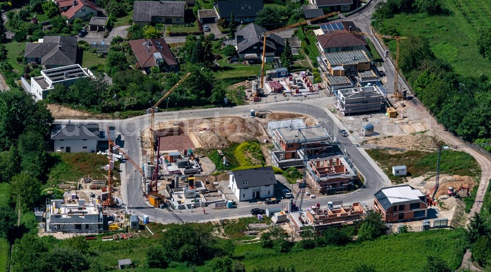Ettenheim from above - Construction sites for new construction residential area of detached housing estate klein Muenchberg in Ettenheim in the state Baden-Wurttemberg, Germany