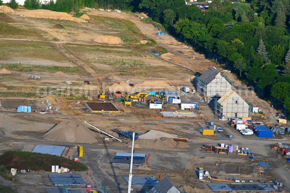 Rüdersdorf from above - Construction sites for new construction residential area of detached housing estate in Ruedersdorf in the state Brandenburg, Germany