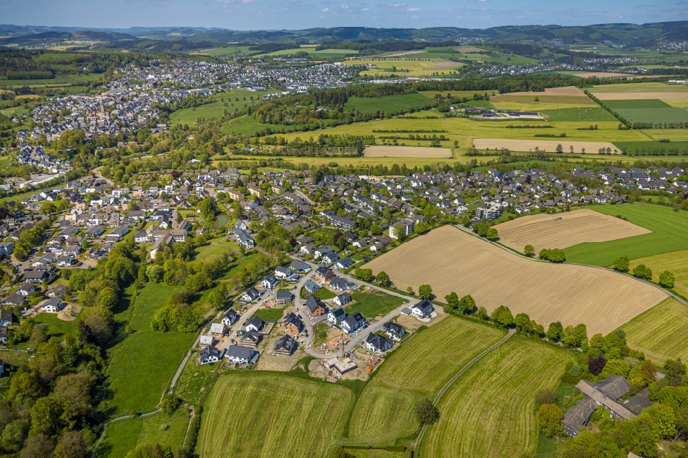 Schmallenberg from the bird's eye view: Construction sites for new construction residential area of detached housing estate An der Viehbahn in Schmallenberg at Sauerland in the state North Rhine-Westphalia, Germany