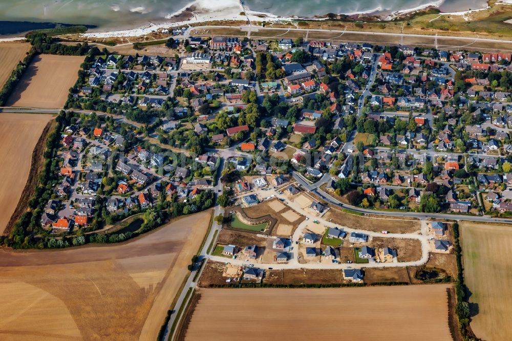 Aerial photograph Stein - Construction sites for new construction residential area of detached housing estate on street Kirchkoppel in Stein in the state Schleswig-Holstein, Germany