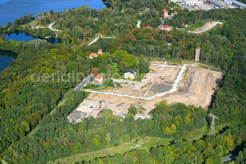 Aerial photograph Rüdersdorf - Construction sites for new construction residential area of detached housing estate of Stienitzsee Real Estate (SRE) GmbH on street Berliner Strasse in the district Hennickendorf in Ruedersdorf in the state Brandenburg, Germany
