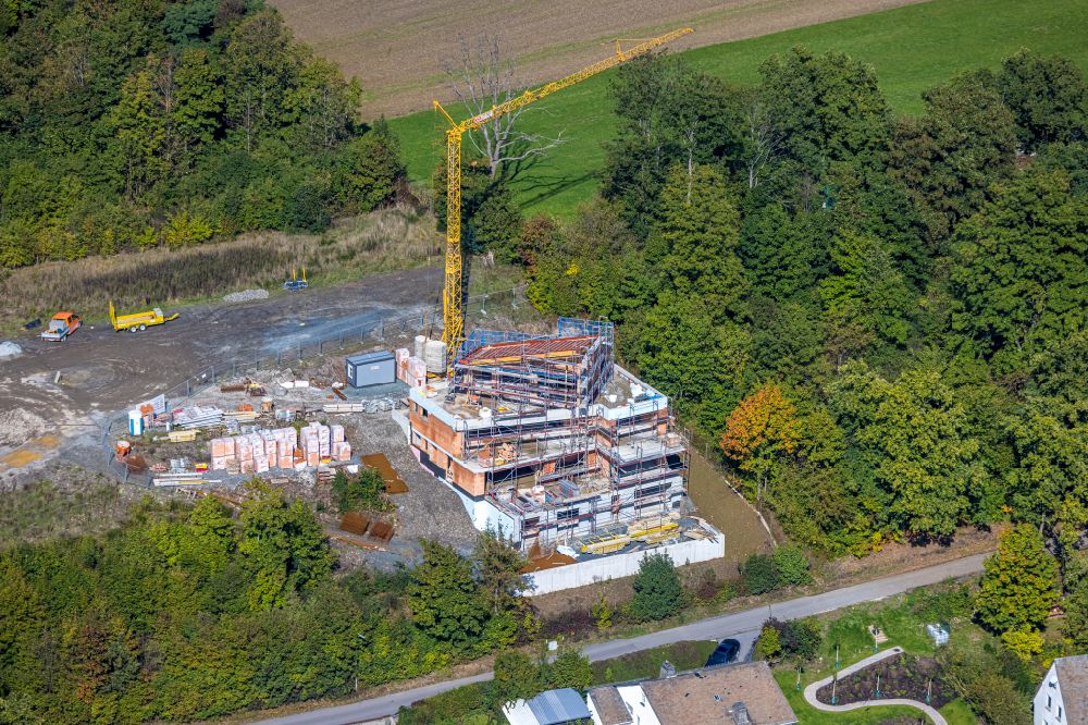 Aerial image Meschede - Construction sites for new construction residential area of detached housing estate Unterm Hasenfeld on street Unterm Hasenfeld in Meschede at Sauerland in the state North Rhine-Westphalia, Germany