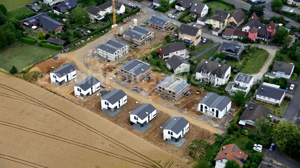 Vinxel from above - Construction sites for new construction residential area of detached housing estate on street Landgrabenstrasse in Vinxel in the state North Rhine-Westphalia, Germany