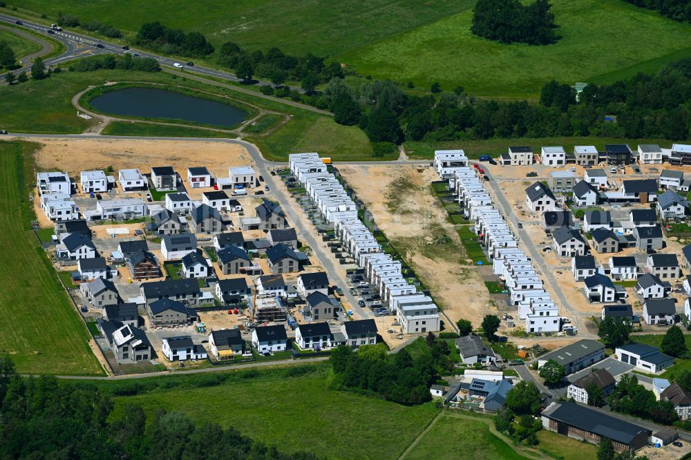 Aerial photograph Wolfsburg - Construction sites for new construction residential area of detached housing estate Wiesengarten on Dieselstrasse - Kaethe-Paulus-Strasse in the district Reislingen in Wolfsburg in the state Lower Saxony, Germany
