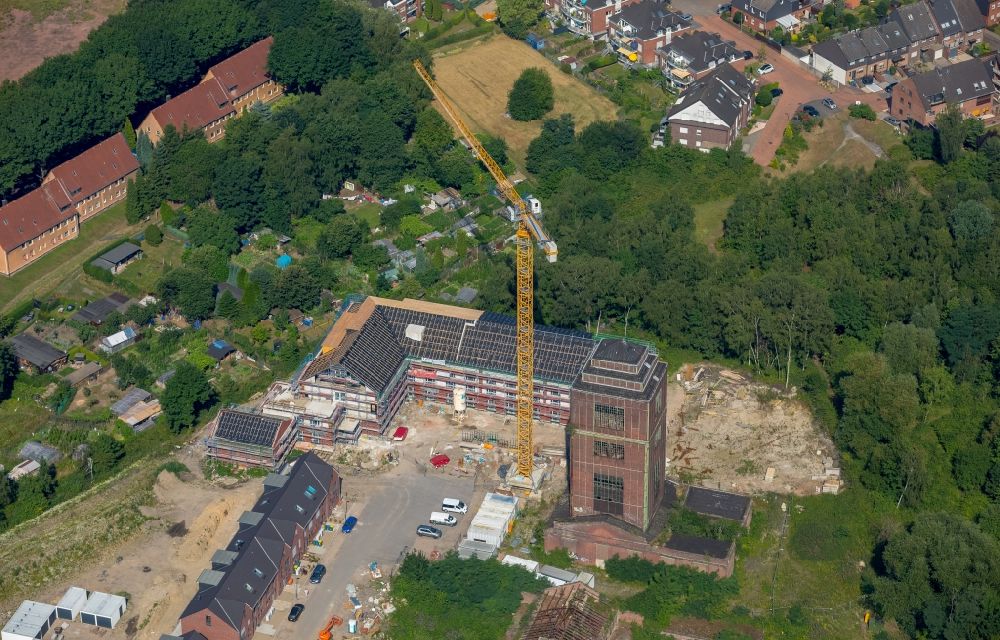 Oberhausen from the bird's eye view: Construction sites and development area for a new residential estate on site of the former mining pit and mine shaft IV of the Zeche Osterfeld in Oberhausen in the state of North Rhine-Westphalia