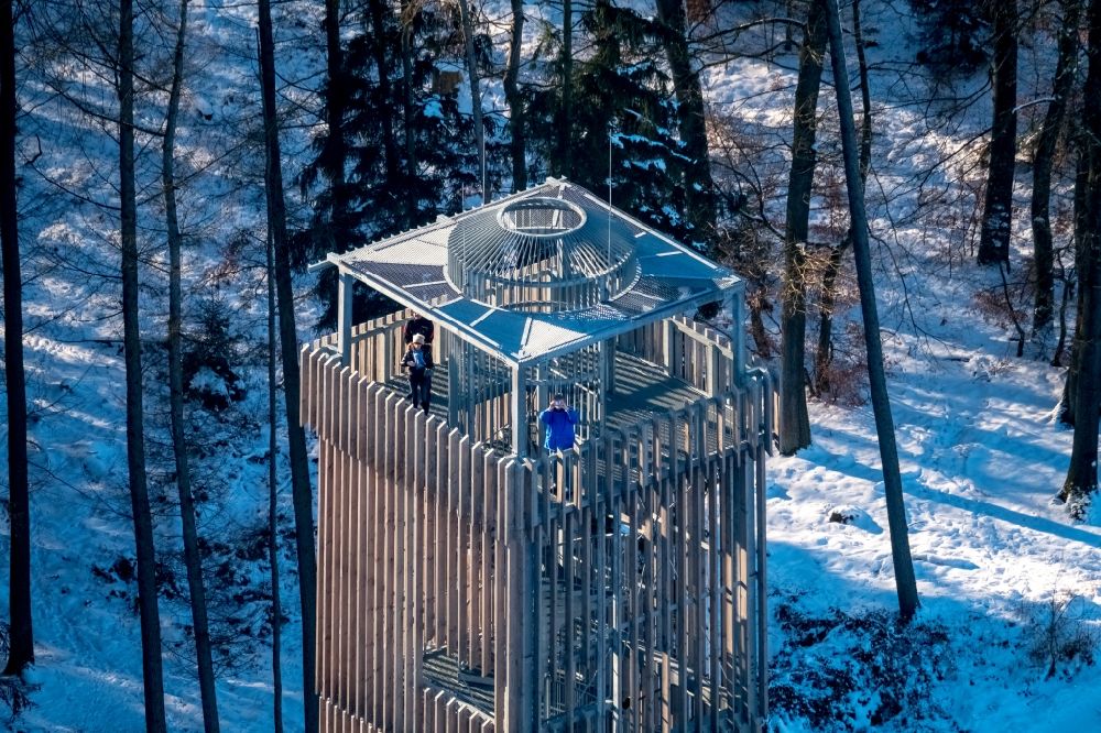 Möhnesee from the bird's eye view: Building of the observation tower Moehnesee tower in the wintry snow-covered Arnsberger wood in Moehnesee in the federal state North Rhine-Westphalia