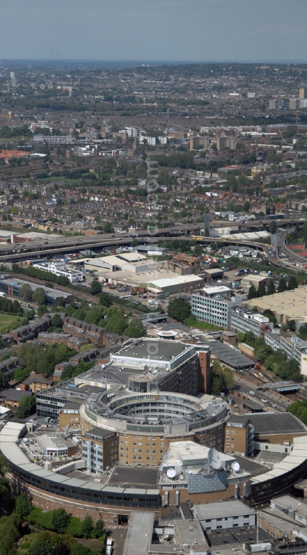 Aerial image London - View of the BBC Televison Centre at White City in West London, the headquarters of the BBC. The building was opened in 1960 and is one of the world's largest buildings, which were designed exclusively for television
