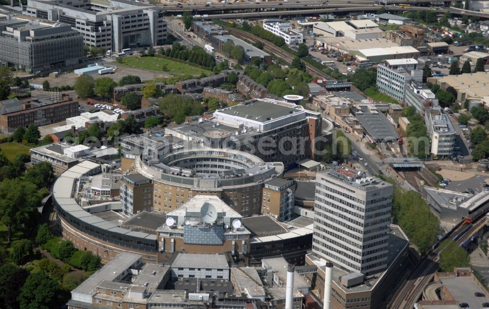 Aerial photograph London - View of the BBC Televison Centre at White City in West London, the headquarters of the BBC. The building was opened in 1960 and is one of the world's largest buildings, which were designed exclusively for television