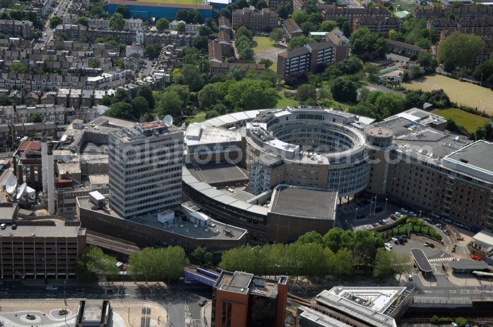 London from above - View of the BBC Televison Centre at White City in West London, the headquarters of the BBC. The building was opened in 1960 and is one of the world's largest buildings, which were designed exclusively for television