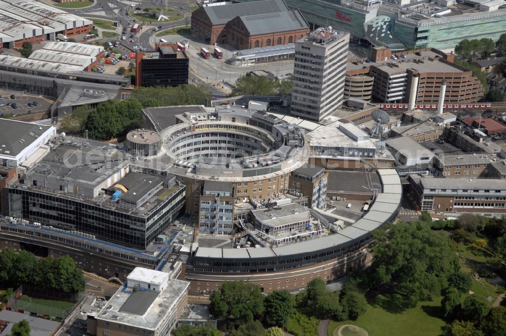 Aerial photograph London - View of the BBC Televison Centre at White City in West London, the headquarters of the BBC. The building was opened in 1960 and is one of the world's largest buildings, which were designed exclusively for television