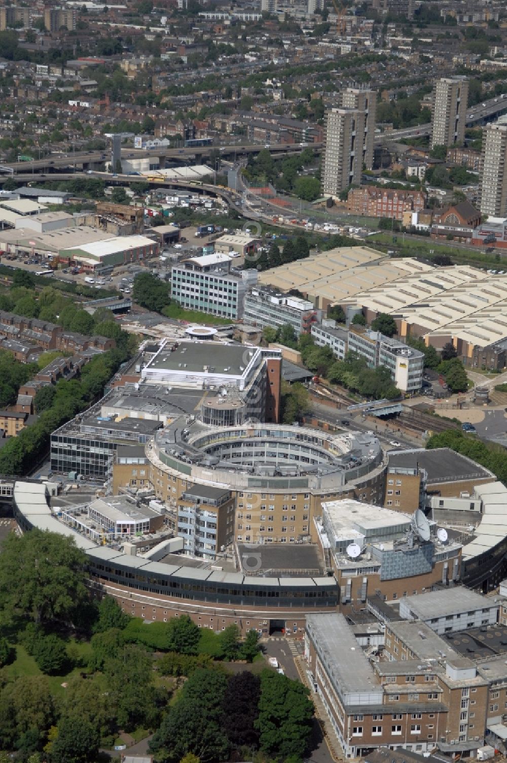 London from the bird's eye view: View of the BBC Televison Centre at White City in West London, the headquarters of the BBC. The building was opened in 1960 and is one of the world's largest buildings, which were designed exclusively for television