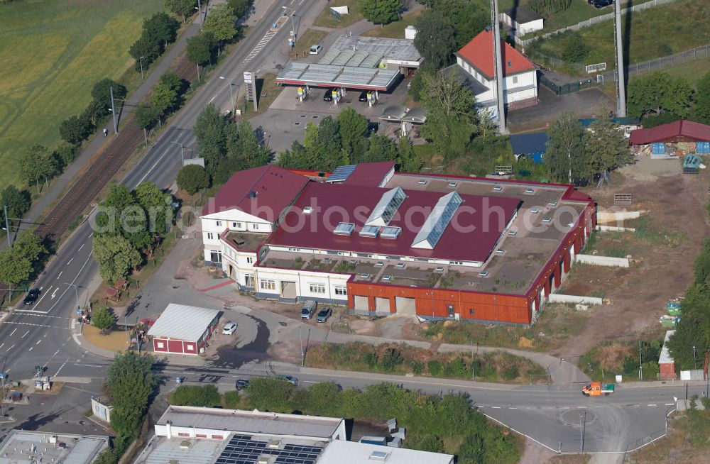 Erfurt from the bird's eye view: Building construction site and new construction of a production hall on the premises of the bakery - confectionery Landbaeckerei Thieme GmbH on street Binderslebener Landstrasse in the district Bindersleben in Erfurt in the state Thuringia, Germany