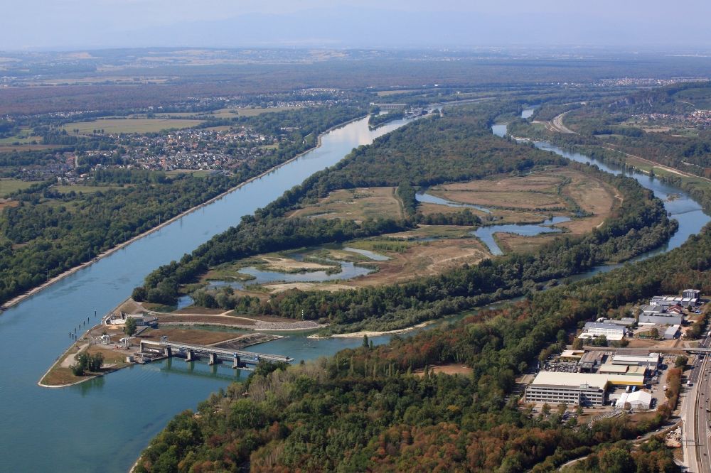 Aerial photograph Weil am Rhein - At Village-Neuf in France, the Grand Canal d'Alsace begins. The French company EdF operates a small hydro power plant and a fish ladder. Thus, the residual amount of water for the Old Rhine is utilized to produce electricity