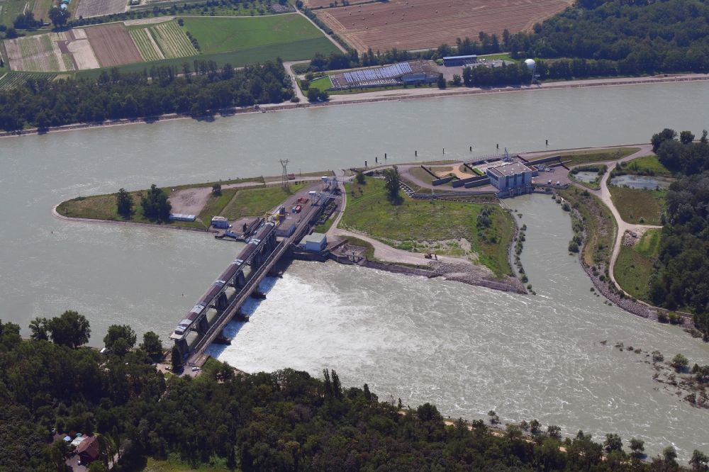 Weil am Rhein from above - At Village-Neuf in France, the Grand Canal d'Alsace begins. The French company EdF operates a small hydro power plant and a fish ladder. Thus, the residual amount of water for the Old Rhine is utilized to produce electricity