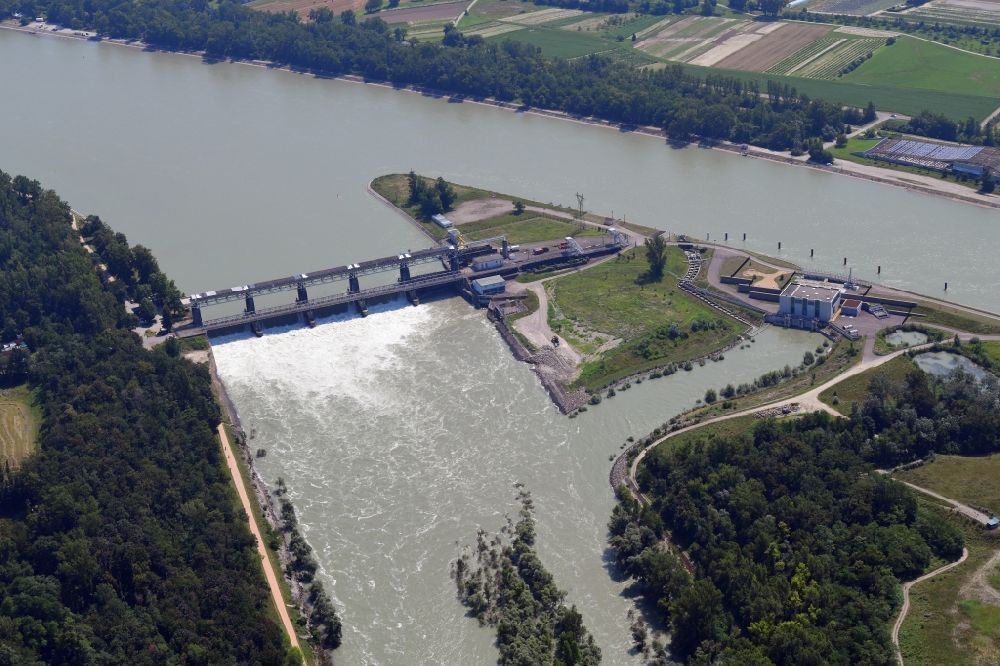 Weil am Rhein from the bird's eye view: At Village-Neuf in France, the Grand Canal d'Alsace begins. The French company EdF operates a small hydro power plant and a fish ladder. Thus, the residual amount of water for the Old Rhine is utilized to produce electricity