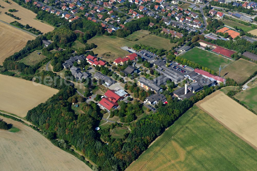 Eisingen from the bird's eye view: Home for disabled people and workshop Assisted Living of St. Josefs-Stift Eisingen gemeinnuetzige GmbH on street Pfarrer-Robert-Kuemmert-Strasse in the district Erbachshof in Eisingen in the state Bavaria, Germany