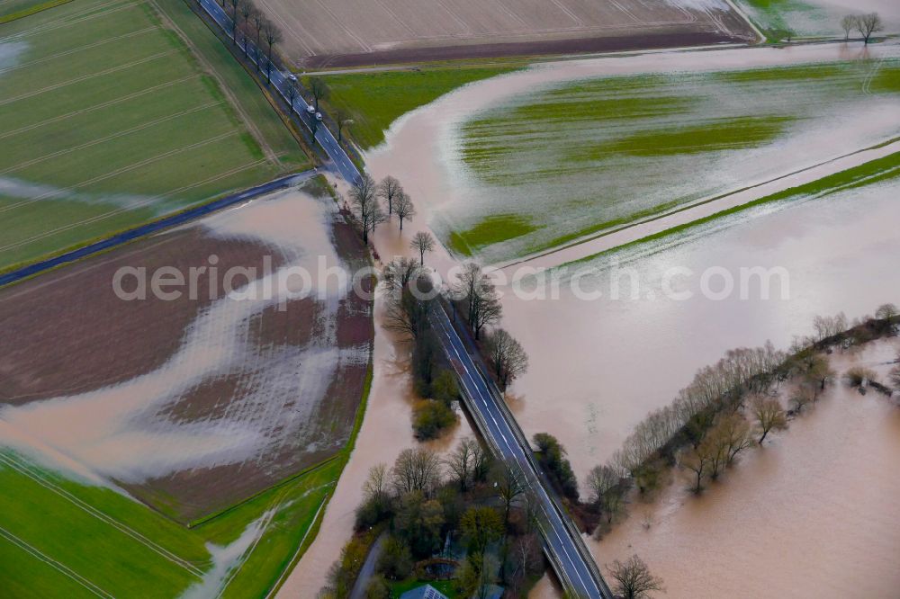 Aerial image Northeim - Riparian areas and flooded flood meadows due to a river bed leading to flood levels Leine on street B241 in Northeim in the state Lower Saxony, Germany