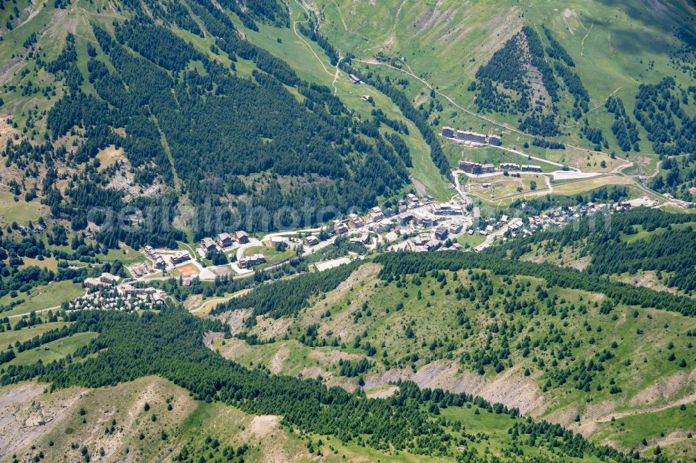 Allos from the bird's eye view: Village - view on the edge of forested areas in Allos in Provence-Alpes-Cote d'Azur, France