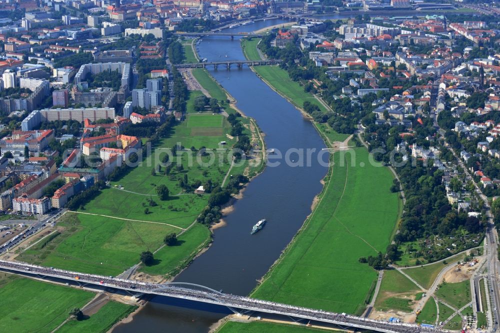 Dresden from the bird's eye view: Visitors and pedestrians at the opening after completion of Waldschloesschenbrücke on the river Elbe in Dresden in Saxony