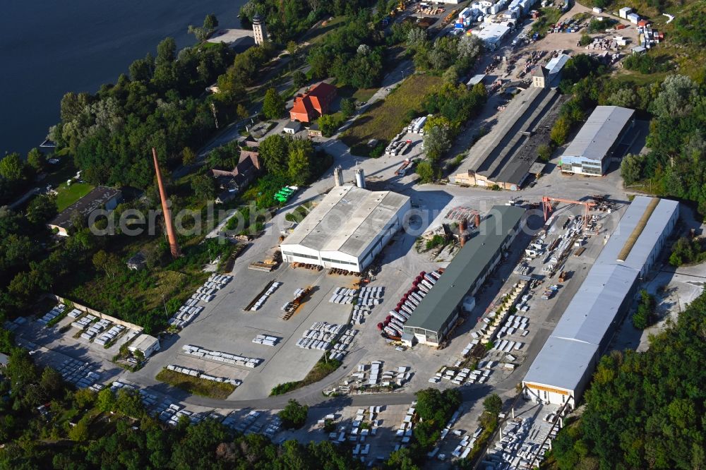 Rüdersdorf from the bird's eye view: Mixed concrete and building materials factory of TBG Transportbeton Oder-Spree GmbH & Co. KG of factory Hennickendorf on Berliner Strasse in the district Hennickendorf in Ruedersdorf in the state Brandenburg, Germany
