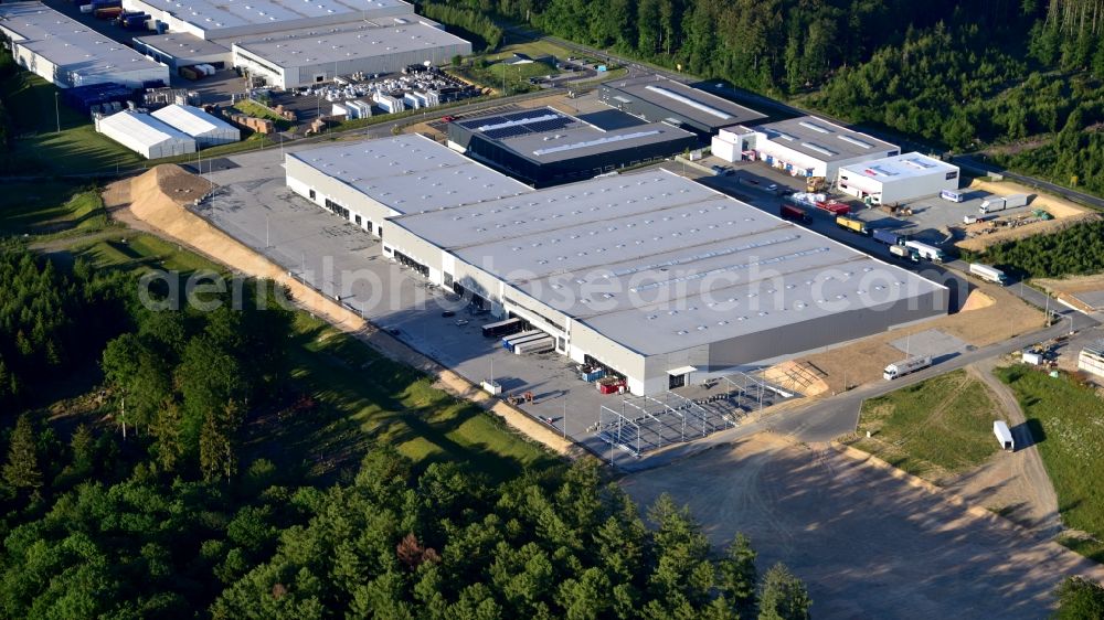 Dürrholz from above - Company premises of Gundlach Automotive Corporation / Reifen Gundlach GmbH in Duerrholz in the state Rhineland-Palatinate, Germany