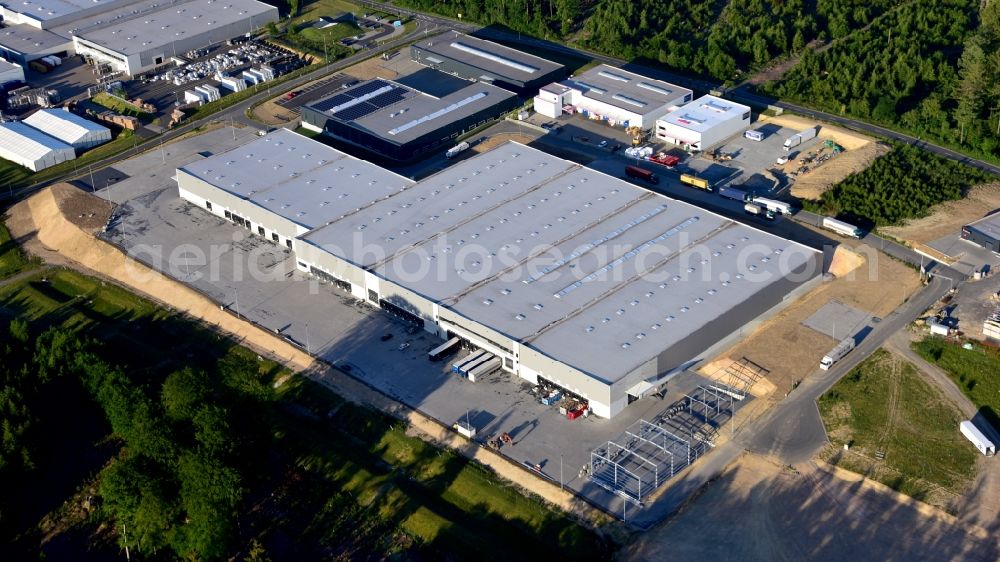 Dürrholz from the bird's eye view: Company premises of Gundlach Automotive Corporation / Reifen Gundlach GmbH in Duerrholz in the state Rhineland-Palatinate, Germany