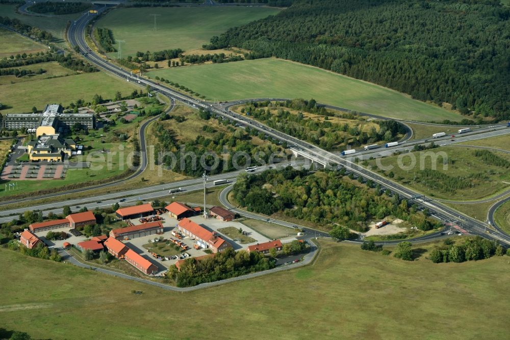 Rangsdorf from the bird's eye view: Site of the depot of the Autobahnmeisterei of Landesbetrieb Strassenwesen at the southern Berliner Ring motorway A10 in Rangsdorf in the state Brandenburg