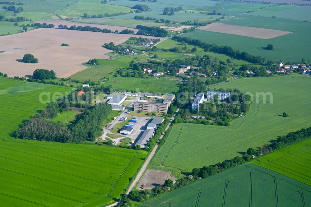 Badingen from the bird's eye view: Site of the depot of the of THW and the ST Logistik Oberhavel GmbH on street Hellberger Strasse in Badingen in the state Brandenburg, Germany
