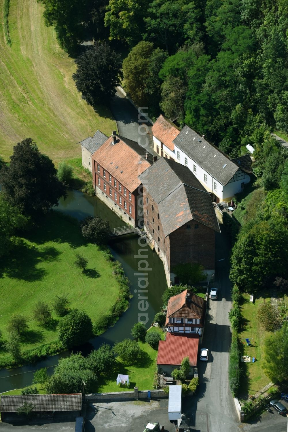 Aerial photograph Warburg - Building and production halls on the premises of the brewery Warburger Brauerei in the district Dalheim in Warburg in the state North Rhine-Westphalia, Germany