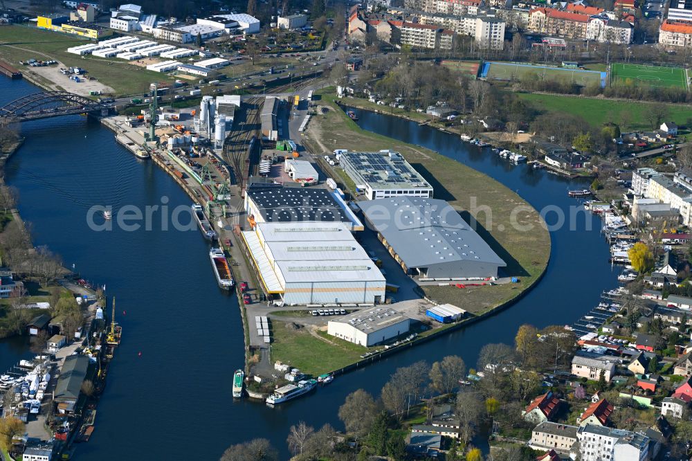 Berlin from above - Wharves and piers with ship loading terminals in the inner harbor Suedhafen on the Havel river in the district Spandau in Berlin, Germany