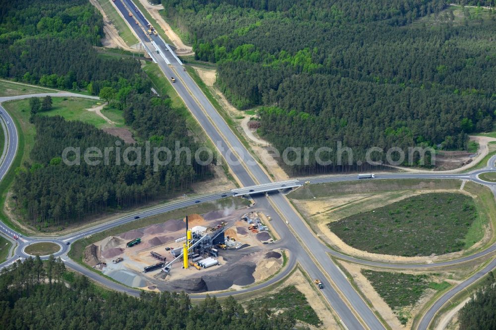 Ludwigslust from the bird's eye view: Bitumen - mixing plant to the driving surface production to the construction site on the traffic flow on the motorway junction of the A14 motorway at exit Ludwigslust in Mecklenburg - Western Pomerania