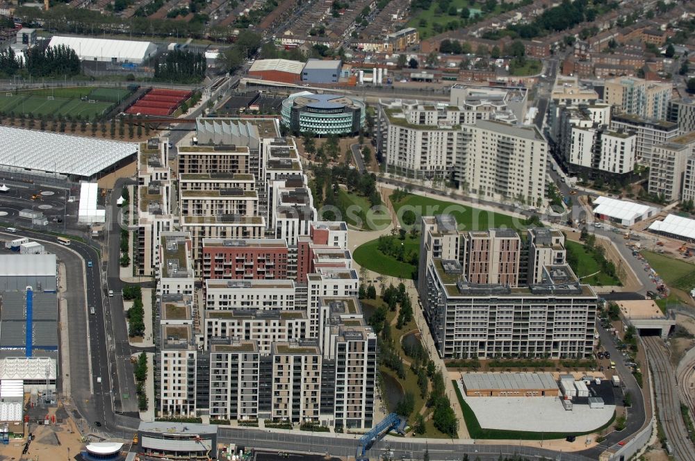 Aerial image London - View at apartment buildings of the Olympic Village at Victory Park in the district Stratford in London in the county of Greater London in the UK. Here all the Olympic athletes were housed. View at apartment buildings of the Olympic Village at Victory Park in the district Stratford in London in the county of Greater London in the UK. Here all the Olympic athletes were housed. Also many sporting and cultural events during the 2012 Olympic Games took place here. Victoria Park is one of the most important historical, public parks in London and one of its oldest. Architects were Caruso St. John, Ian Ritchie, Lifschutz Davidson Sandilands, Rijke Marsh Morgan, DSDHA, Denton Corker Marshall and Eric Parry. For the landscape planning the company Büro Vogt in collaboration with Patel Tylor and Fletcher Priest was responsible