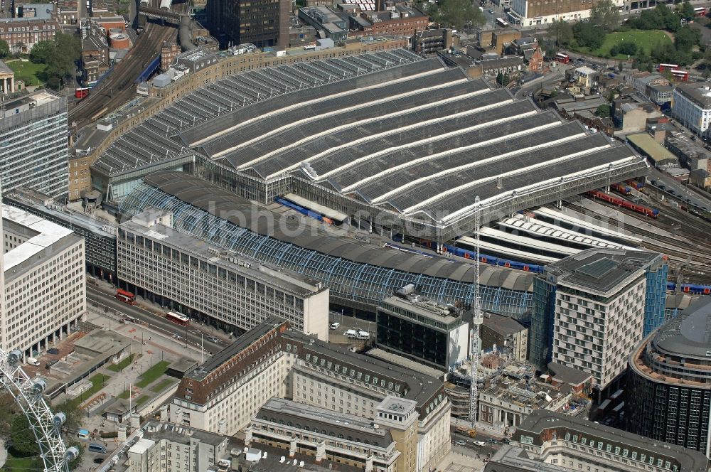 Aerial image Bishop's Ward - View of the Waterloo station in London. Opened in 1848, London Waterloo Station is one of the main stations in London and a major transportation hub. It is located in the borough of Lambeth London Borough and is named after the Battle of Waterloo near Brussels. The station complex consists of four interconnected parts, the actual train station, the former Euro Star terminal Waterloo International, the spatially separated station Waterloo East and the underground subway station on London Underground