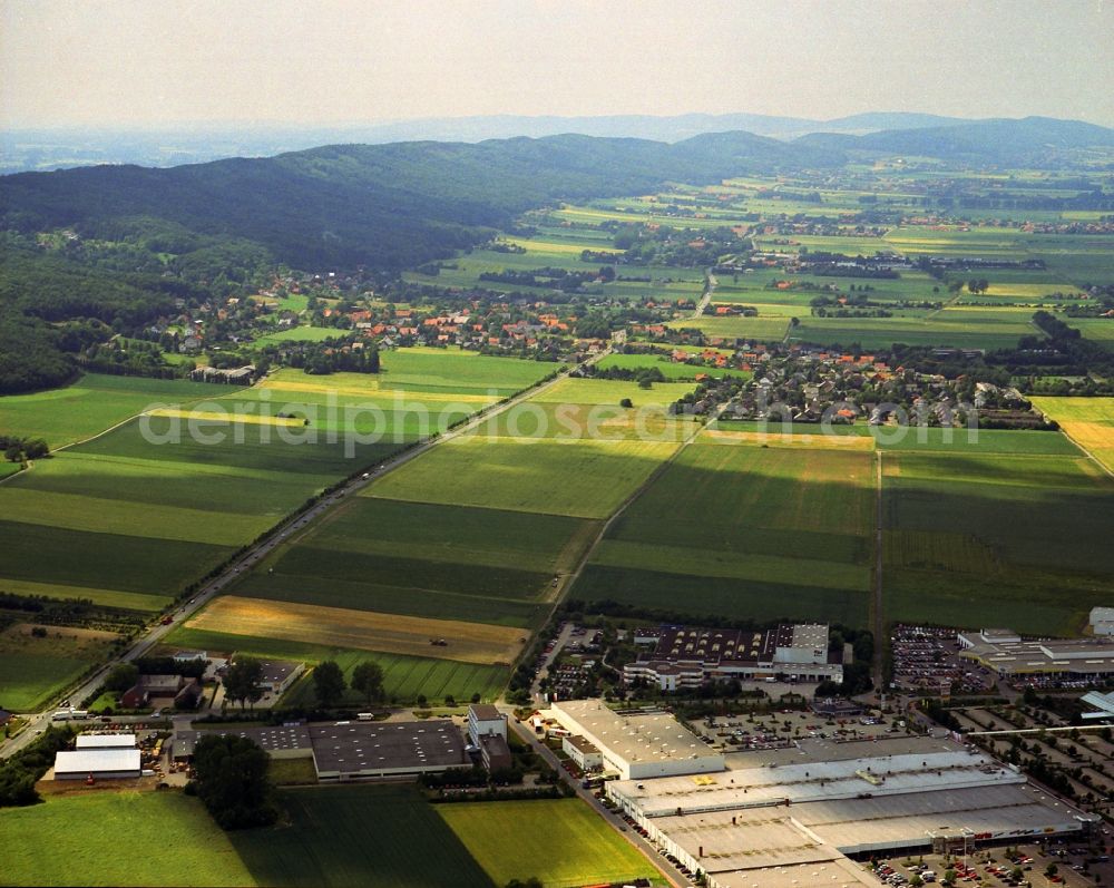 Aerial image Porta Westfalica - View over a business park in the district Barkhausen onto Haeverstaedt and further districts of Minden at the bottom of the Mountains Wiehengebirge in the state North Rhine-Westphalia