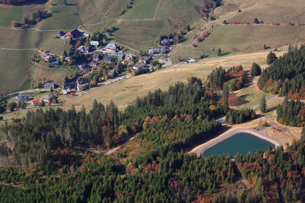 Aerial image Todtnau - Looking over the water reservoir for artificial snow to the village of Todtnauberg in the Black Forest in the state Baden-Wurttemberg, Germany