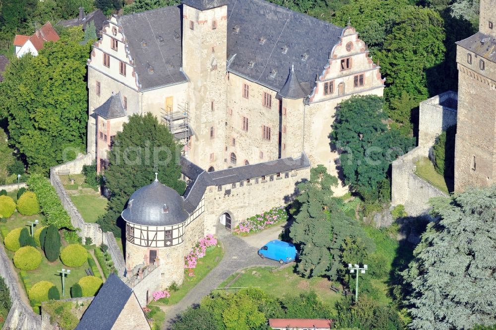 Kronberg im Taunus from the bird's eye view: View of the Castle Kronberg in Kronberg im Taunus in Hesse. The high medieval castle rock was born 1220-1230 and belongs to the town of Kronberg since 1992. Among the Foundation's Castle Kronberg, the building was fundamentally renovated until 2004 and now serves as a museum and for various events