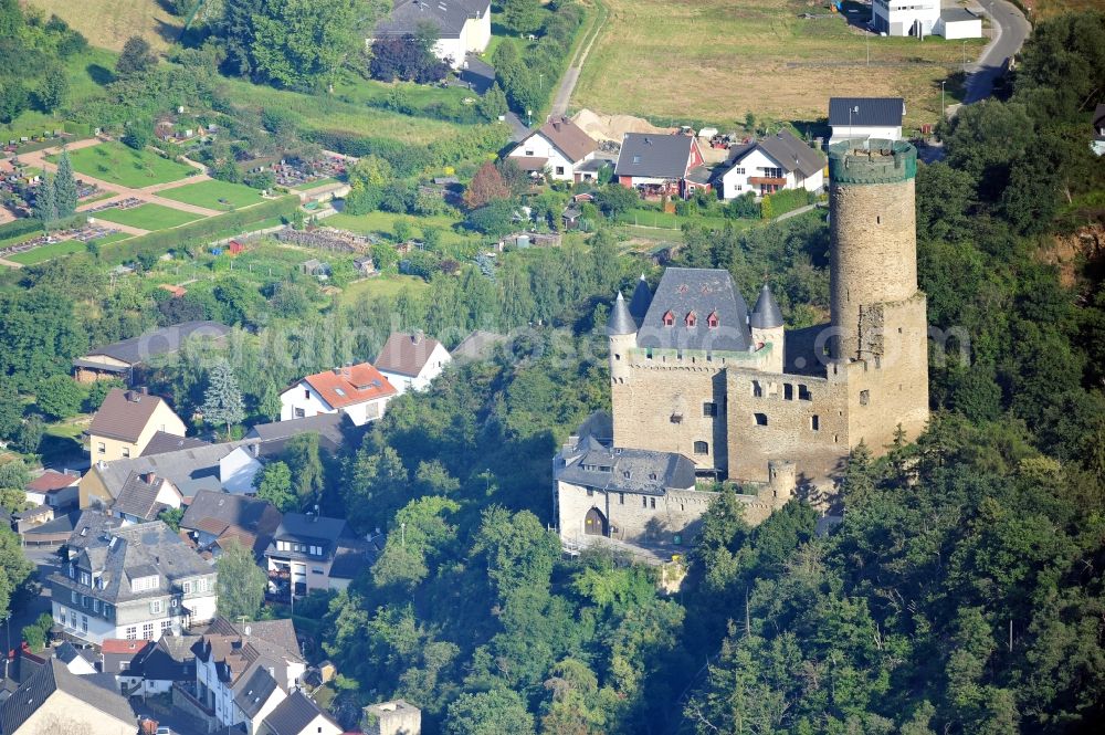 Aerial photograph Burgschwalbach - View of the castle Schwalbach near Burgschwalbach in the state of Rhineland-Palatinate. The late medieval hilltop castle was created in 1368, of which the keep, a round courtyard, a hall, a palace and a city wall with two towers have been preserved. Since 2004, there was a restaurant in the castle that has already been opened in 1858