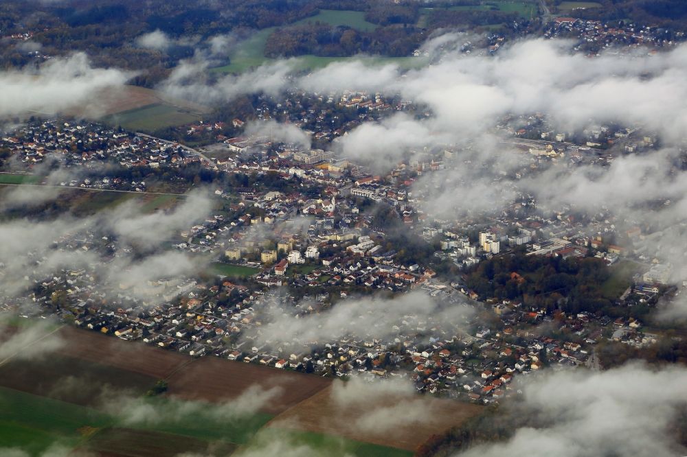 Aerial photograph Gauting - View through the clouds to the streets and houses of the residential areas in Gauting in the state Bavaria, Germany