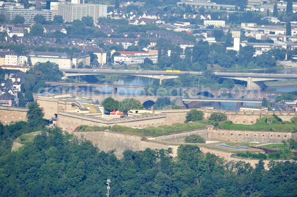 Koblenz from the bird's eye view: View of the fort Ehrenbreitstein across from the mouth of the Moselle near Koblenz. The fortification, which has existed since the 16. century, was used by the Prussian army until 1918 and is now owned by the state of Rhineland-Palatinate. It houses the State Museum Koblenz, the hostel Koblenz, the memorial of the German land forces as well as various administrative agencies. Since 2002, the fortress is a UNESCO World Heritage Upper Middle Rhine Valley, and cultural property protected under the Hague Convention