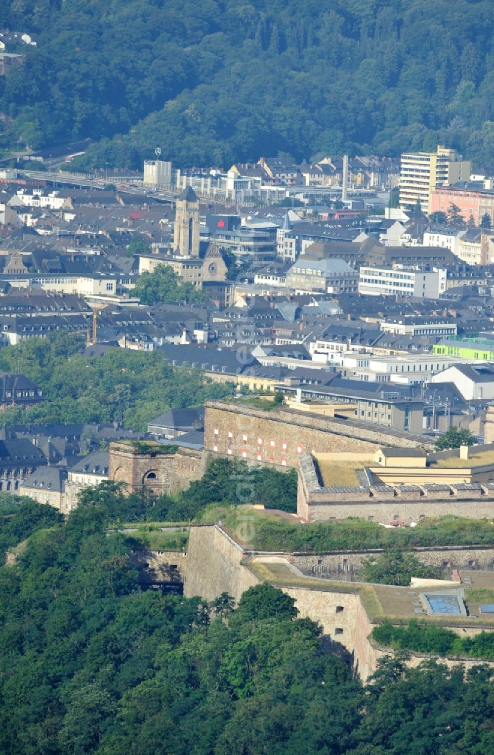 Koblenz from above - View of the fort Ehrenbreitstein across from the mouth of the Moselle near Koblenz. The fortification, which has existed since the 16. century, was used by the Prussian army until 1918 and is now owned by the state of Rhineland-Palatinate. It houses the State Museum Koblenz, the hostel Koblenz, the memorial of the German land forces as well as various administrative agencies. Since 2002, the fortress is a UNESCO World Heritage Upper Middle Rhine Valley, and cultural property protected under the Hague Convention