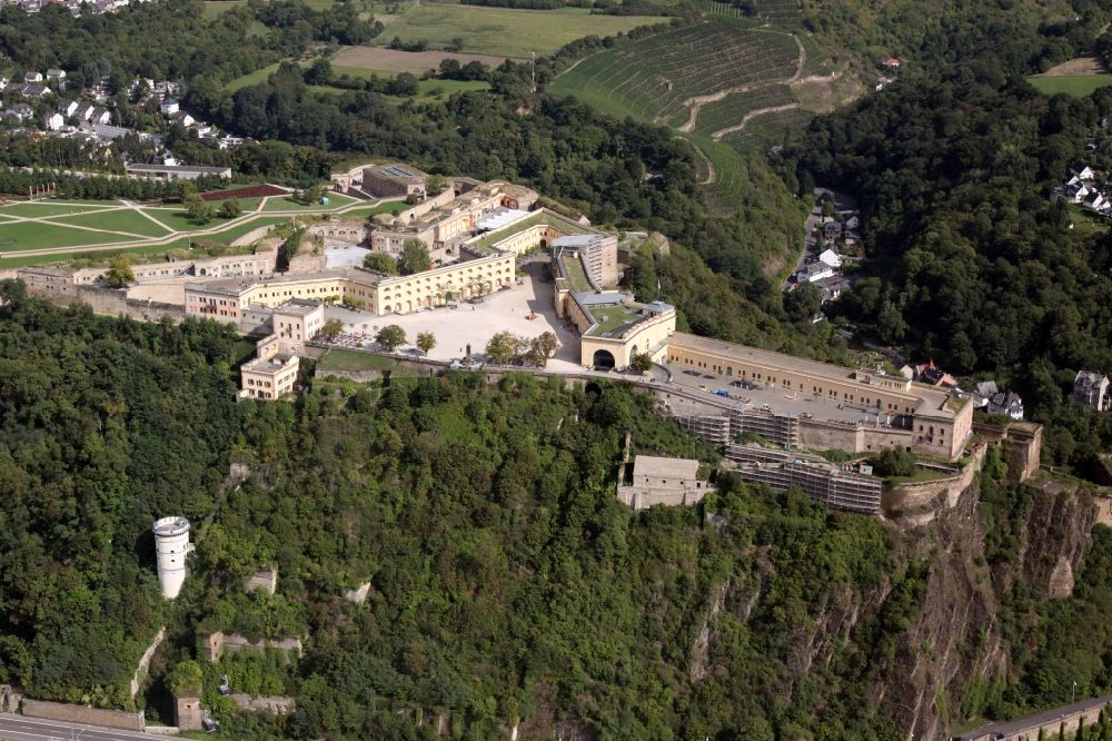 Aerial photograph Koblenz - View of the fort Ehrenbreitstein at Koblenz. The fortification, which has existed since the 16. century, was used by the Prussian army and is now owned by the state of Rhineland-Palatinate. It houses the State Museum Koblenz, the hostel Koblenz, the memorial of the German land forces as well as various administrative agencies. Today the fortress is a UNESCO World Heritage Upper Middle Rhine Valley, and cultural property protected under the Hague Convention
