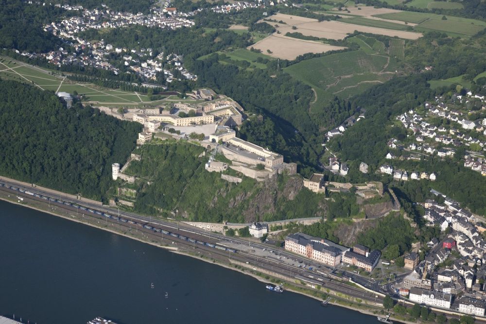 Koblenz from the bird's eye view: View of the fort Ehrenbreitstein at Koblenz in the state rhineland palatinate. The fortification, which has existed since the 16. century, was used by the Prussian army and is now owned by the state of Rhineland-Palatinate. It houses the State Museum Koblenz, the hostel Koblenz, the memorial of the German land forces as well as various administrative agencies. Today the fortress is a UNESCO World Heritage Upper Middle Rhine Valley, and cultural property protected under the Hague Convention