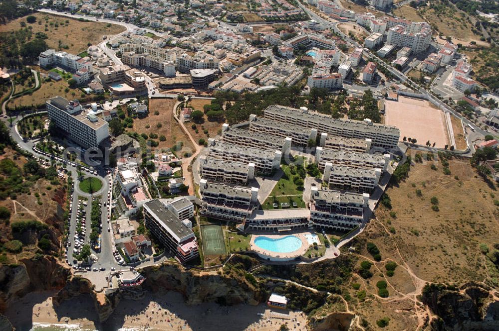 Aerial photograph Lagos - Blick auf ein Hotelkomplex in Lagos an der Algarve in Portugal. Lagos ist eine Hafenstadt und liegt etwa 30 km östlich von Cabo de Sao Vicente, dem südwestlichsten Punkt Europas nahe Sagres. Lagos gehört dem Distrikt Faro an und ist Verwaltungssitz eines gleichnamigen Kreises.