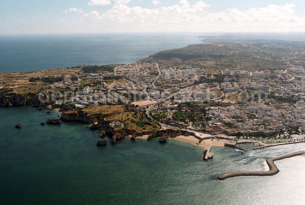 Aerial photograph Lagos - Blick auf Lagos an der Algarve in Portugal. Lagos ist eine Hafenstadt und gehört dem Distrikt Faro an und ist Verwaltungssitz eines gleichnamigen Kreises.