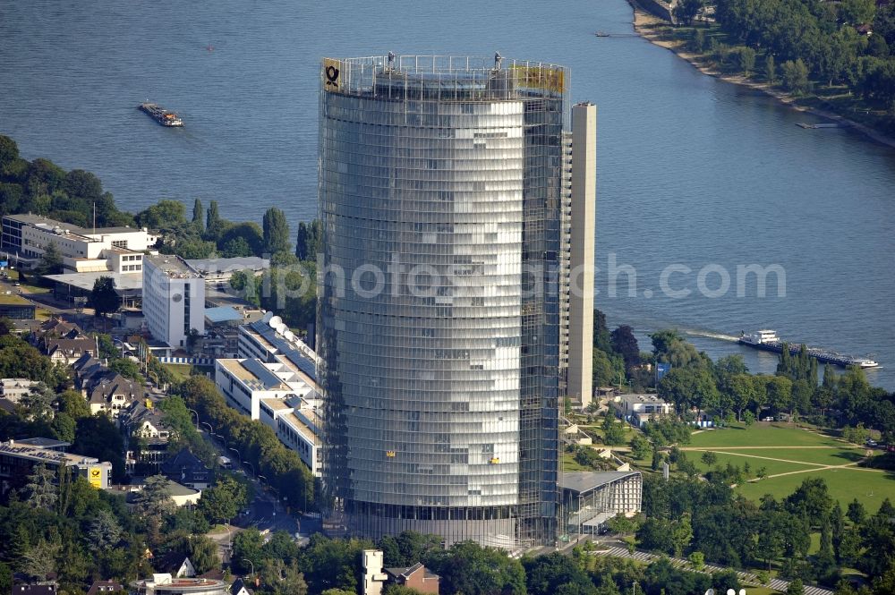 Bonn from above - View of the Post Tower in Bonn in North Rhine-Westphalia. The 162.5-meter-high office tower is the headquarters of the German logistics company Deutsche Post DHL and is owned by Deutsche Post AG. It was designed by the architects Murphy and Jahn and built from 2000 to 2002 in post-modern style