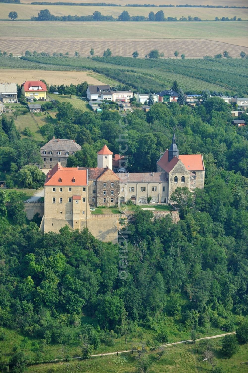 Aerial image Goseck - View of the castle Goseck in the homonymous city in Saxony-Anhalt. The medieval castle and abbey was built in the 9th Century and is now used by Schloss Goseck e.V. The association, which was founded in 1998, started its business on the European music and culture center, and organizes concerts. There are also guest rooms, a castle-tavern and information spaces for Goseck solar observatory since 2006