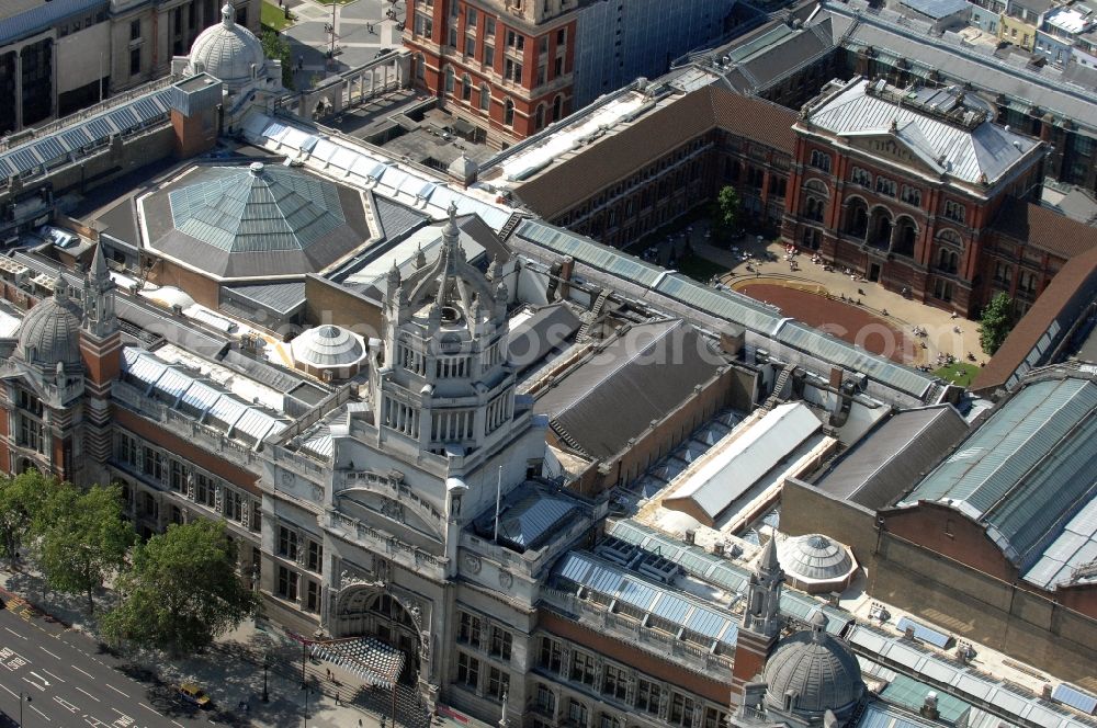 London from the bird's eye view: View of the Victoria and Albert Museum in London. The Victoria and Albert Museum, which was founded in 1852 known as the South Kensington Museum, is located on Cromwell Road in Kensington, West London and owns the largest collection of decorative arts and design in the world. It was visited by 2.6 million people in 2010. Since 1 September 2011, it is led by Martin Roth, the former Director General of the State Art Collections Dresden