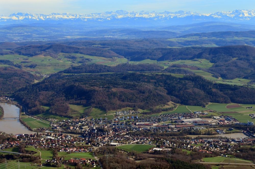 Aerial image Laufenburg - City area and river Rhine in Laufenburg in the state Baden-Wurttemberg, Germany. Clear view over Switzerland to the mountain range of the Swiss Alps