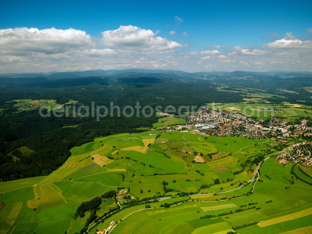 Bonndorf from above - Bonndorf in the Black Forest in the state of Baden-Württemberg. The town's location opposite the Forest is visible. The Black Forest is Germany's highest and largest connected low mountain range, located in the Sout West of the state of Baden-Württemberg. Today, it is mostly significant for its tourims sites and regions