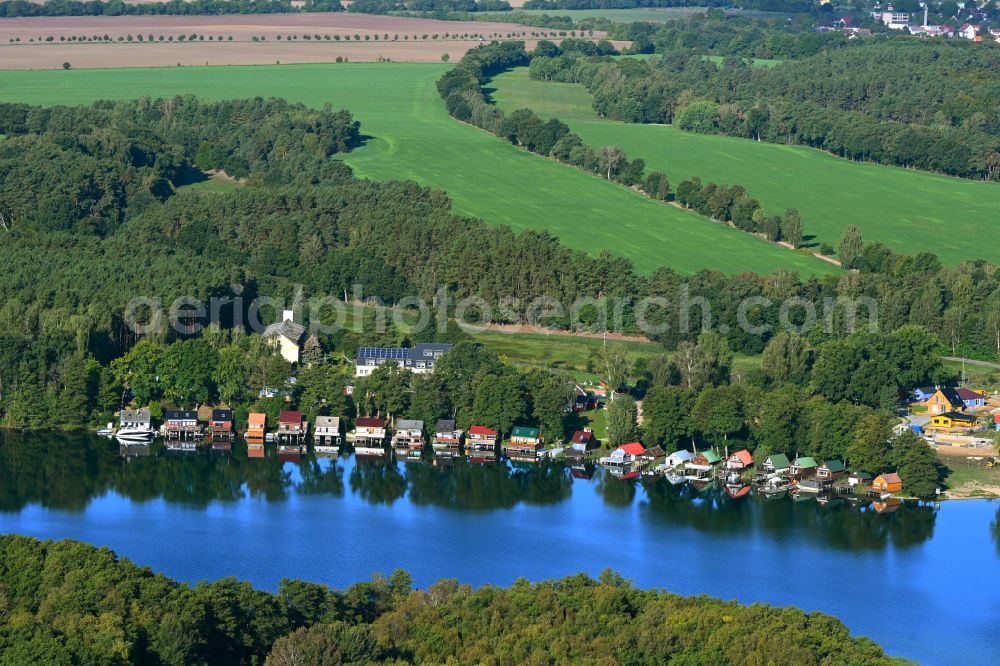 Aerial image Dorf Zechlin - Boat House rank with the recreational marine jetties and boat mooring area on the banks on Grosser Zechliner See in Dorf Zechlin in the state Brandenburg, Germany